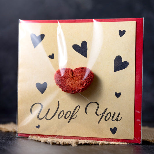 Card with a red heart and 'Woof You' text on a dark background